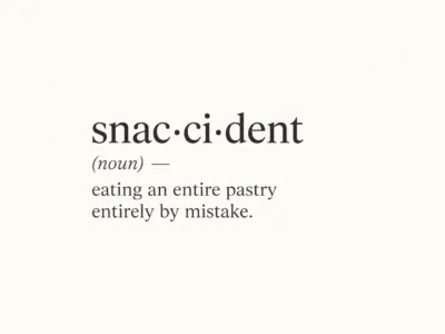 Typographic card defining snaccident as eating an entire pastry entirely by mistake
