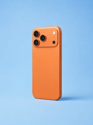 Orange smartphone shown back-first, leaning on a flat blue studio background